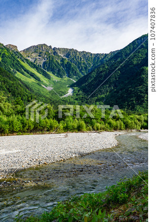 Azusa River and the Hotaka mountain range seen from Konashidaira campsite in Kamikochi, Nagano Prefecture Azusa River and the Hotaka mountain range seen from Konashidaira campsite in Kamikochi, Nagano Prefecture 107407836