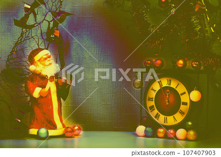 Santa Claus and vintage clock. New Year's Christmas toys,garlands Santa Claus and vintage clock. New Year's Christmas toys,garlands 107407903