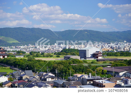 Nara city area and East Tower restoration work under construction, view from Saidaiji Temple Nara city area and East Tower restoration work under construction, view from Saidaiji Temple 107408056