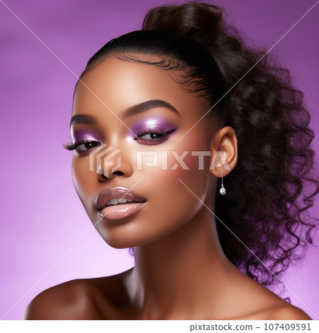 Portrait of a beautiful afro american woman with bright  purple makeup . Attractive dark skin girl with healthy skin of face. Pretty and Sensual afro american model posing on purple background. 107409591