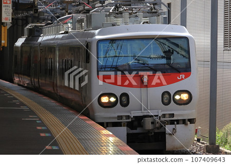 East-i passing the station platform 107409643