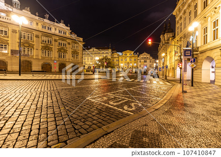 Cobbled Lesser Town Square by night in Prague, Czechia 107410847