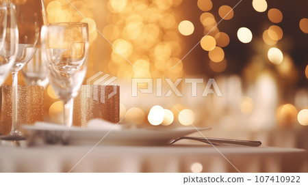 Beautiful outdoor table setting with flowers and candles Beautiful outdoor table setting with flowers and candles 107410922