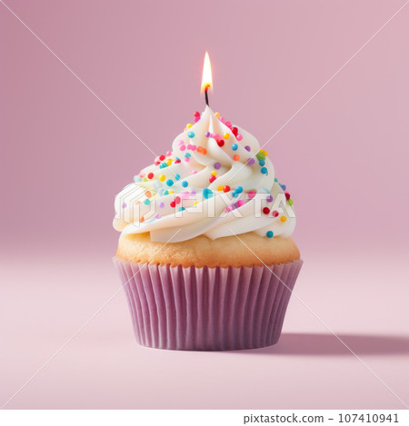 Birthday cupcake with candles on pastel colored background Birthday cupcake with candles on pastel colored background 107410941
