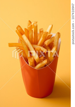 french fries in a paper cup, created with generative ai french fries in a paper cup, created with generative ai 107410947