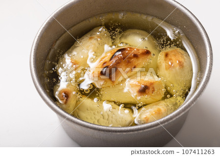 Grilled garlic in oil Grilled garlic in oil 107411263