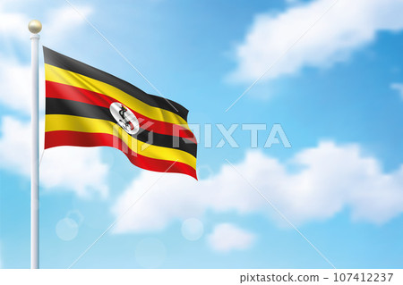 Waving flag of Uganda on sky background. Template for independence 107412237