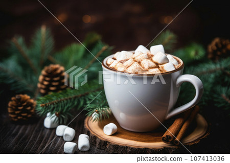 cup of hot chocolate with marshmallows on wooden table and christmas decoration background 107413036