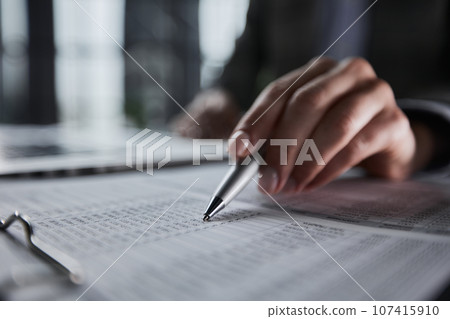analyzing income charts and graphs. Close up.Business analysis and strategy concept. 107415910