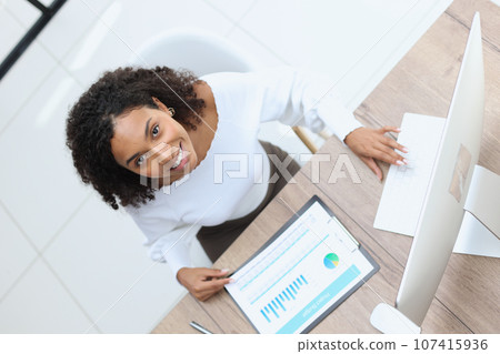 Portrait of confident businesswoman in modern office Portrait of confident businesswoman in modern office 107415936