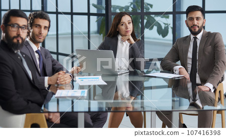 Business colleagues around the table making strong business team. Business colleagues around the table making strong business team. 107416398