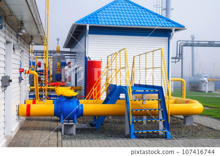 Gas distribution station. View of territory of gas distribution station with pipes and containers 107416744