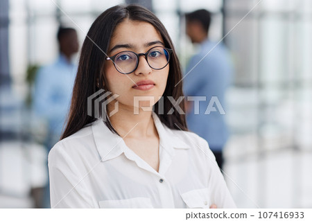 Young student or teacher looking at camera 107416933