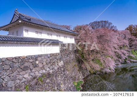 Yamagata Castle Ruins Higashi Otemon Gate in Kajo Park, Yamagata Prefecture, with railroad tracks along the moat 107417618