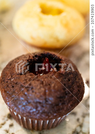 In the process of crafting delightful cactus cupcakes, the freshly baked vanilla and chocolate cupcakes are generously filled with tangy lemon and sweet raspberry filling, enhancing the flavors and In the process of crafting delightful cactus cupcakes, the freshly baked vanilla and chocolate cupcakes are generously filled with tangy lemon and sweet raspberry filling, enhancing the flavors and 107419903