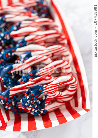 American flag. Red, white, and blue chocolate-covered pretzel twists. American flag. Red, white, and blue chocolate-covered pretzel twists. 107419991