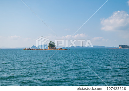 Kujukushima landscape with blue sky with white clouds and blue sea Kujukushima landscape with blue sky with white clouds and blue sea 107422318