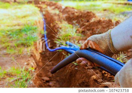 Applying insulation to water PVC pipe that will be buried in underground 107423758