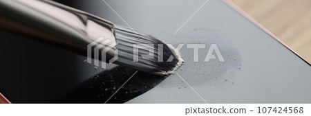 Brush processes fingerprints on screen of modern smartphone Brush processes fingerprints on screen of modern smartphone 107424568