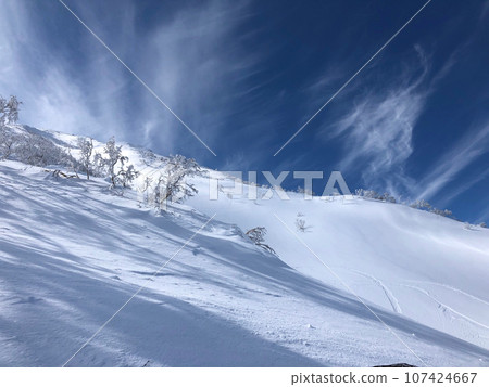 Hokkaido backcountry - blue sky and Mt. Yotei in winter Hokkaido backcountry - blue sky and Mt. Yotei in winter 107424667