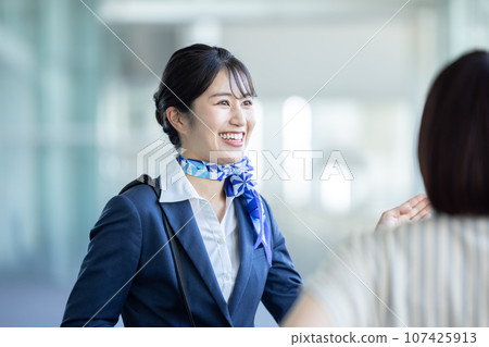 Airport ground staff guiding Airport ground staff guiding 107425913