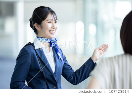 Airport ground staff guiding Airport ground staff guiding 107425914