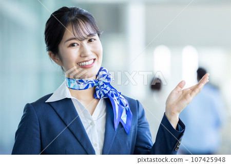 Airport ground staff guiding Airport ground staff guiding 107425948