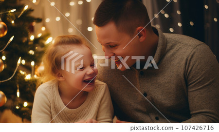 Happy family with a child with Down syndrome and parents against the background Happy family with a child with Down syndrome and parents against the background 107426716