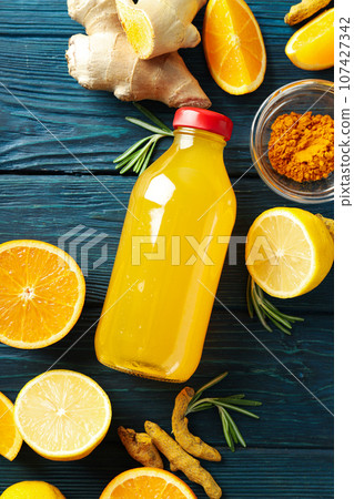 Concept of healthy drink - ginger turmeric liquid Concept of healthy drink - ginger turmeric liquid 107427342