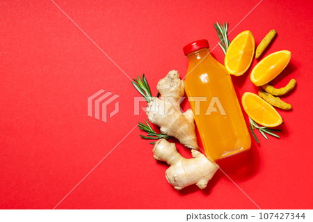 Concept of healthy drink - ginger turmeric liquid Concept of healthy drink - ginger turmeric liquid 107427344