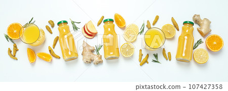 Concept of healthy liquid - ginger turmeric drink Concept of healthy liquid - ginger turmeric drink 107427358