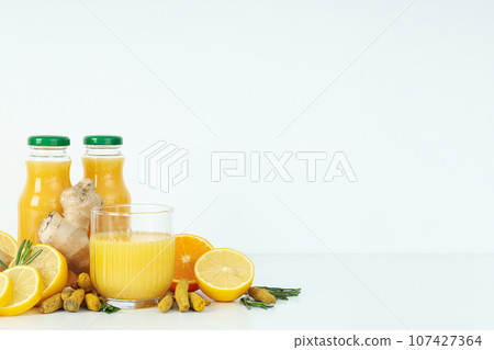 Concept of healthy liquid - ginger turmeric drink 107427364