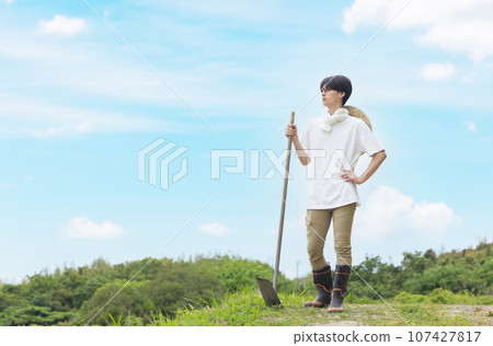 Young male agriculture farmer Young male agriculture farmer 107427817