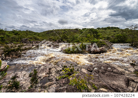 The river Mucugezinho in Chapada Diamantina, Bahia, Brazil with running water, forming a waterfall and Poco do Pato 107428224