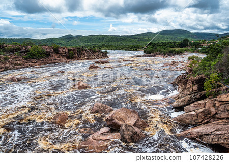 Donana Waterfall in Paraguassu River with dark waters in Andarai, Chapada Diamantina, Bahia in Brazil 107428226