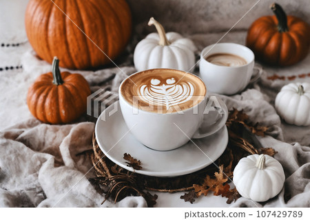 halloween still life with latte, decorations and pumpkins , holiday background 107429789