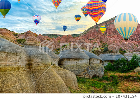 Fly of air balloons in Unique natural place - Cappadocia , Turkiye. Fly of air balloons in Unique natural place - Cappadocia , Turkiye. 107431154