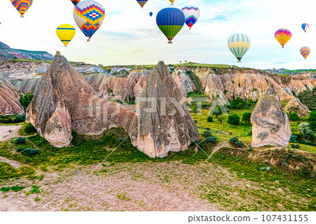 Fly of air balloons in Unique natural place - Cappadocia , Turkiye. Fly of air balloons in Unique natural place - Cappadocia , Turkiye. 107431155