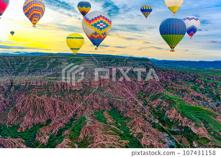 Fly of air balloons in Unique natural place - Cappadocia , Turkiye. Fly of air balloons in Unique natural place - Cappadocia , Turkiye. 107431158