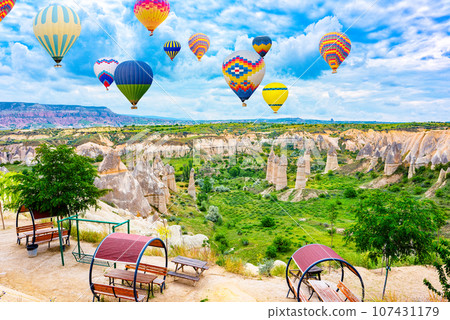Fly of air balloons in Unique natural place - Cappadocia , Turkiye. Fly of air balloons in Unique natural place - Cappadocia , Turkiye. 107431179