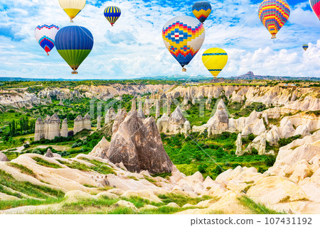 Fly of air balloons in Unique natural place - Cappadocia , Turkiye. Fly of air balloons in Unique natural place - Cappadocia , Turkiye. 107431192