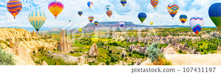 Fly of air balloons in Unique natural place - Cappadocia , Turkiye. Fly of air balloons in Unique natural place - Cappadocia , Turkiye. 107431197