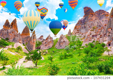 Fly of air balloons in Unique natural place - Cappadocia , Turkiye. Fly of air balloons in Unique natural place - Cappadocia , Turkiye. 107431204
