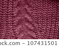 Organic knit background with macro woven threads. 107431501