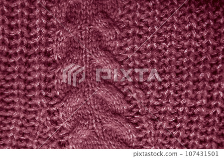 Organic knit background with macro woven threads. 107431501