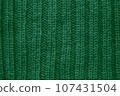 Handmade knit texture with macro weave threads. 107431504