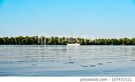 Sunny summer warm river and pleasure boats and yachts 107431521