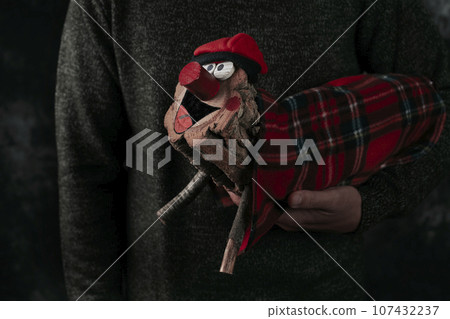 man carrying a homemade catalan tio de nadal man carrying a homemade catalan tio de nadal 107432237