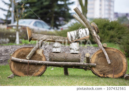 Sculptural motorcycle made of wood. 107432561