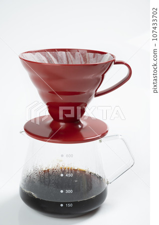 Cup of coffee with a V60 dripper coffee maker Cup of coffee with a V60 dripper coffee maker 107433702